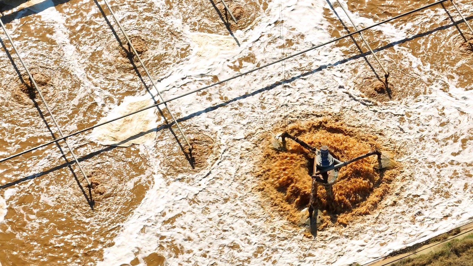 Aerial view of slurry and dewatering processing at an industrial facility